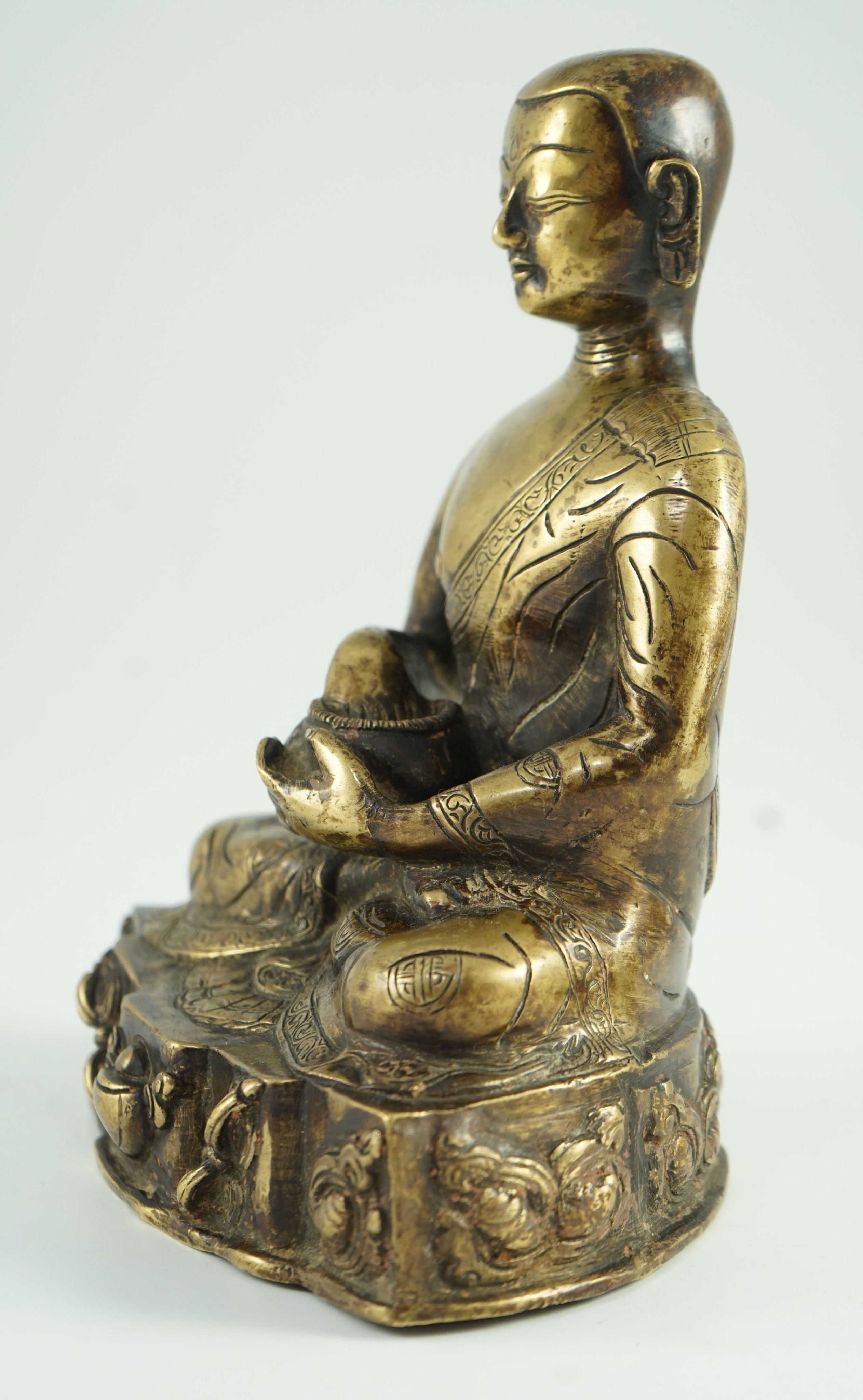 A Himalayan bronze figure of Buddha, 19th century, 21.5cm high